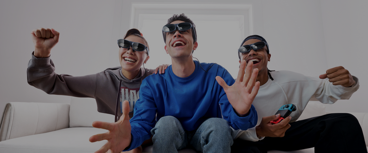 Three people wearing Rokid Max video game glasses for gaming