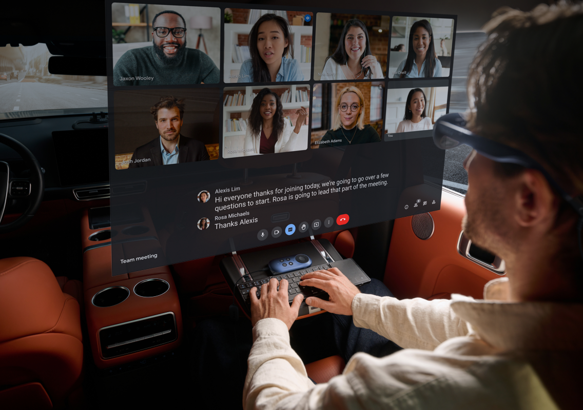 A man using Rokid Max Android glasses and Rokid Station Android TV box for work in a car