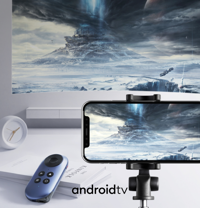 A mobile phone and a Rokid Station Android television box