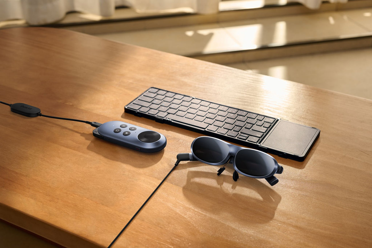A woman using Rokid AR glasses for work