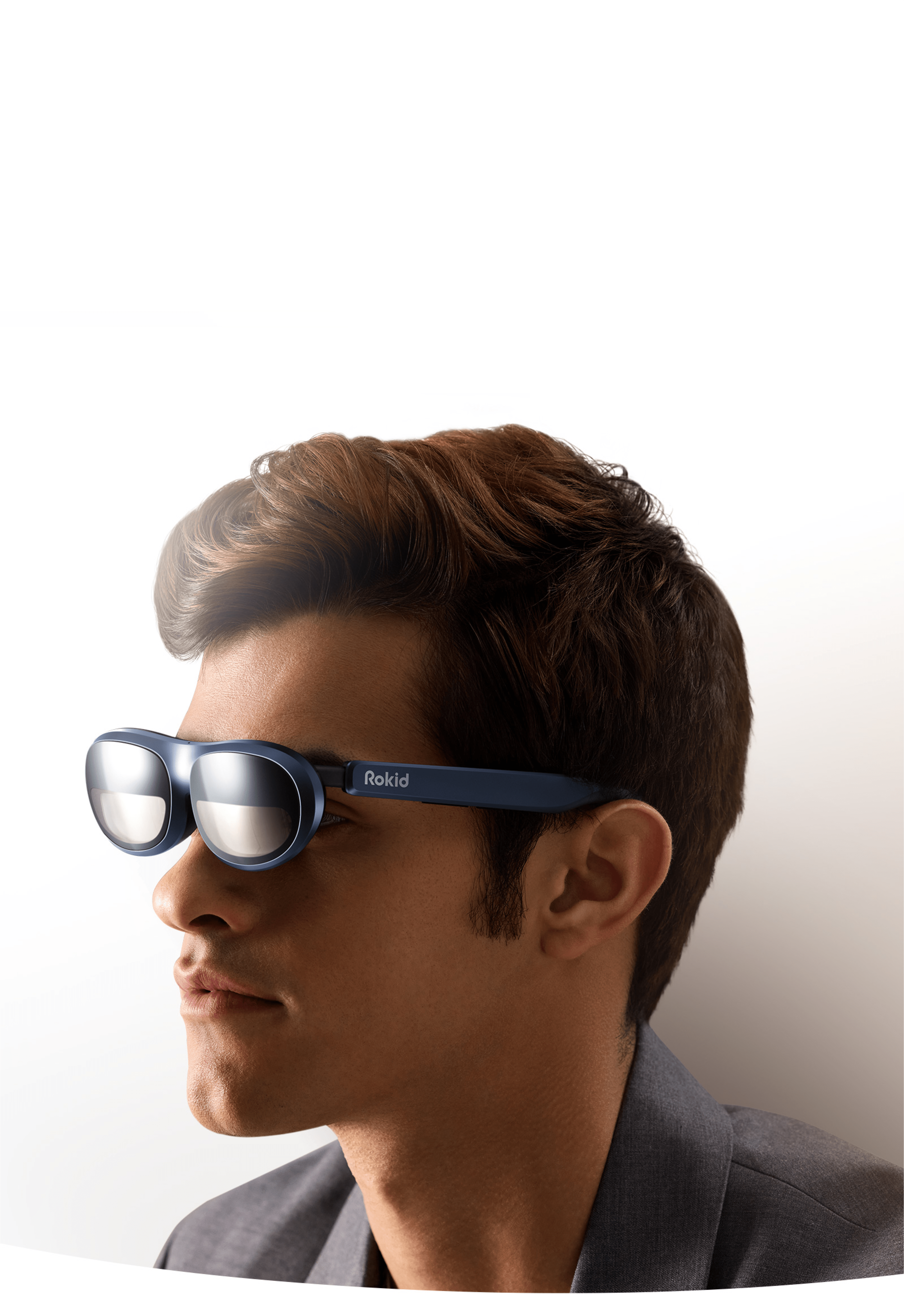 A man wearing Rokid MAX augmented reality glasses